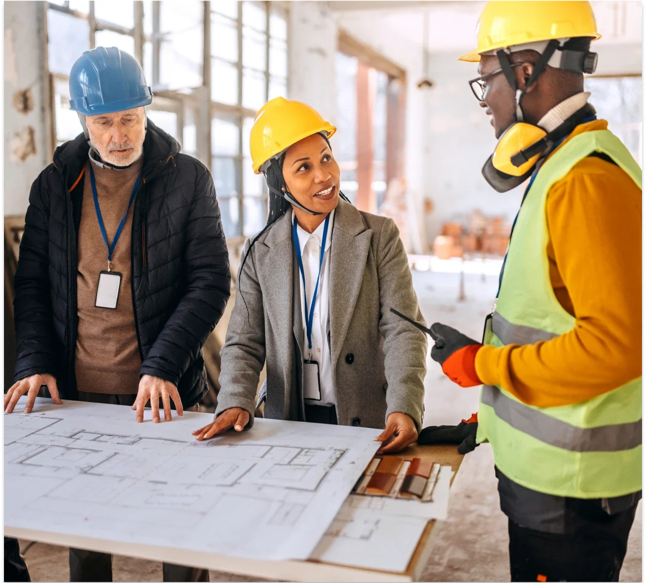 Construction team discussing building plans